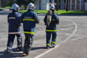 Treino para a 5ª Corrida do Fogo de 2023, em que bombeiros militares irão conduzir triciclos com pessoas com deficiência.