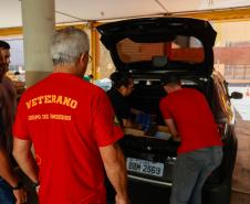 Doação no Corpo de Bombeiros de materiais e alimentos a vítimas das enchentes no Rio Grande do Sul.